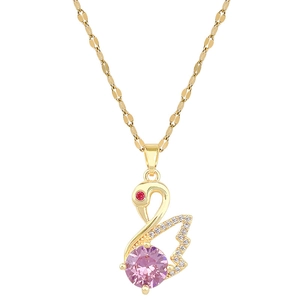 Luxurious swan necklace in gold titanium steel with a faceted pink gemstone pendant
