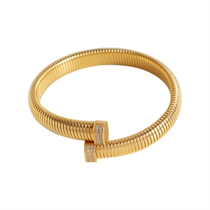 Minimalist gold vertical stripe open cuff bracelet with pavé cubic zirconia ends