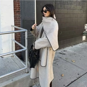 Minimalist light grey wool blend long coat featuring an integrated scarf and black piping
