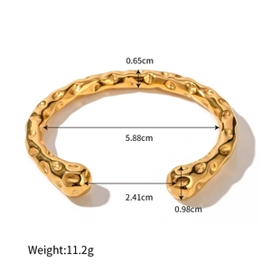 Polished 18K gold-plated stainless steel hammered cuff bracelet with dimension details