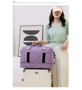Detail of expandable purple travel bag with wet-dry separation and shoe compartment