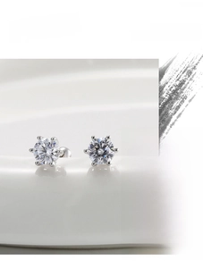 Macro shot of S925 sterling silver hexagram stud earrings with round brilliant cut zircon