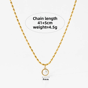 Macro detail of geometric pearl pendant with 8mm width on a gold stainless steel chain