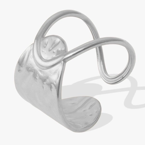 Macro detail of silver adjustable open ring with hand-hammered texture and layered metal band
