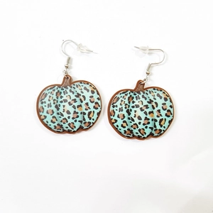 Fall themed pumpkin earrings with leopard print and sunflowers on a mint blue base