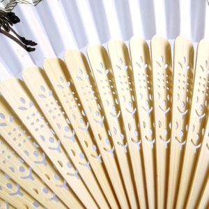 Chinese vintage bamboo folding fan with hollow carving and elegant tassel for dancing