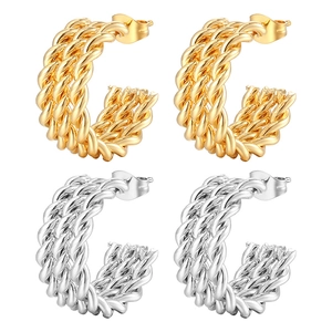 Twisted C-shape earrings set in 18K gold and silver finish stainless steel