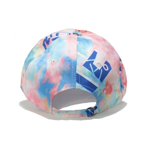 Detail of colorful tie-dye baseball cap with adjustable metal buckle and blue print