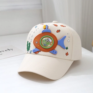 Detail of 3D submarine dinosaur decoration on off-white kids baseball cap