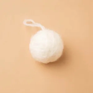 White fluffy yarn ball Christmas ornament with hanging loop for DIY festive decor