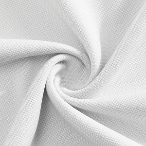 Macro detail showing the breathable mesh texture and white fabric of the polo shirt
