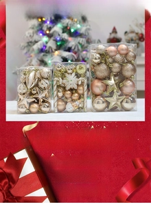 Detailed view of Christmas ornament set with glitter champagne and gold holiday baubles