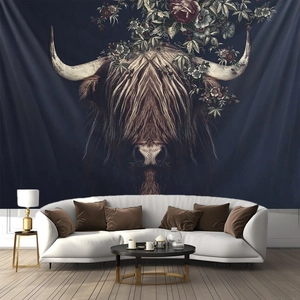 Detail of highlander cow tapestry with floral horns hanging in a modern living room
