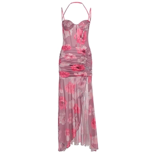 Detail of pink floral print dress showing mesh ruching and side slit with boning