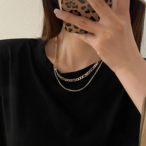 Layered gold chain necklace for women featuring a stylish multi-strand minimalist design