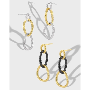 Three-link geometric interlocking earrings in silver, gold and black with hammered texture
