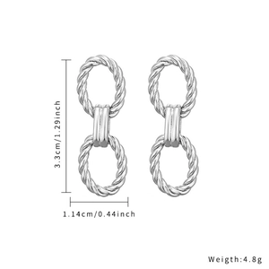 Silver geometric earrings with twisted rope texture showing 3.3cm height dimension
