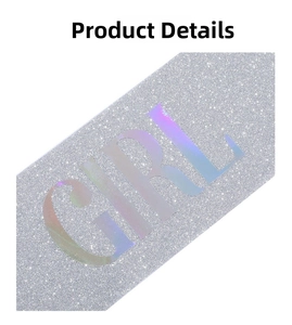 Detailed macro view of silver glitter fabric and holographic text for party sash