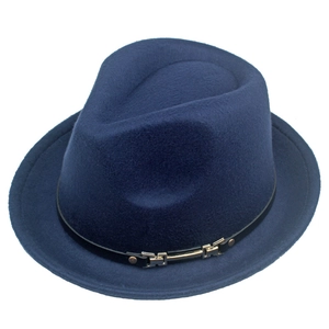 Detailed close-up of dark blue wool fedora with black leather band and gold buckle