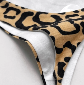 Macro shot of double-layer leopard print cotton fabric with high-quality knit texture