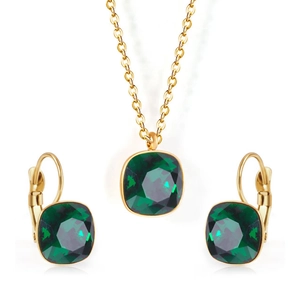 Close-up of golden stainless steel necklace and earrings with square green zircon stones