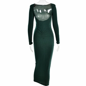 Detail view of sparkly dark green backless dress with ruched texture and long sleeves