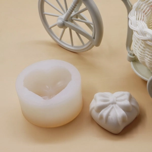 White silicone mold for heart bow shaped mousse cakes and DIY baking crafts