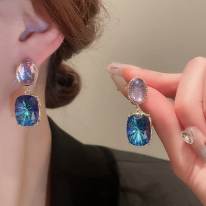 Vintage geometric gold-plated earrings with purple and gradient blue crystals
