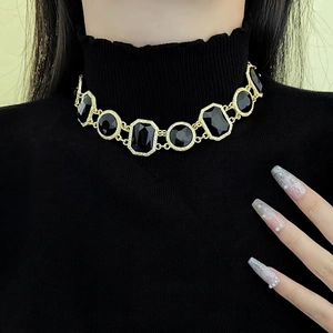 Vintage black crystal choker necklace with gold setting for a baroque luxury style