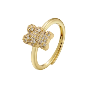 Detailed close-up of an 18K gold-plated adjustable ring featuring a pavé zircon flower design