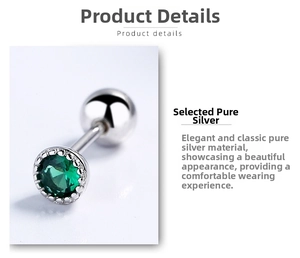 Macro shot of silver stud earring with round green zircon and secure screw ball back