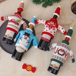 Festive knitted Christmas wine bottle covers with snowman and car patterns