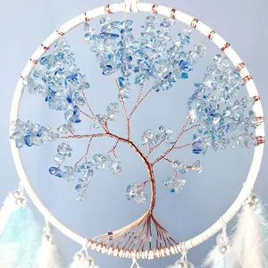 Handmade Tree of Life dream catcher with blue crystal stones and hanging feathers