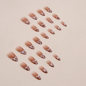 Gradient almond press-on nails in nude brown with white bubble mesh art patterns