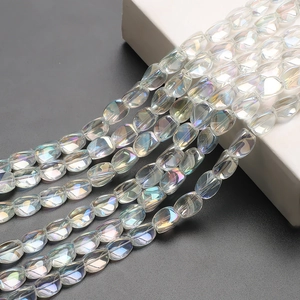 Macro detail of 10x12mm iridescent crystal beads with rainbow finish for DIY jewelry