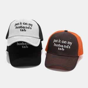 Three embroidered trucker hats with mesh back and 'put it on my husband's tab' slogan