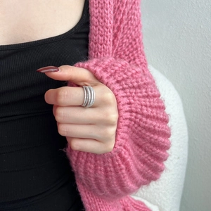 Close-up of S925 silver snake-shaped multi-layer ring with sparkling cubic zirconia