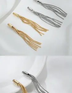 Detail of 14K gold and silver snake chain fringe pendants for DIY jewelry crafting