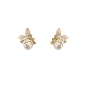Elegant gold butterfly pearl stud earrings with sparkling diamonds on white background
