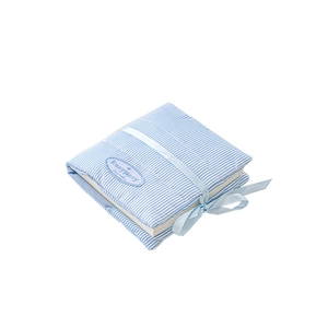 Quilted blue striped cotton notebook cover with ribbon bow and soft padding texture