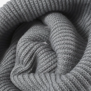 Close-up of thick grey ribbed knit beanie with thermal double-layer fish scale pattern