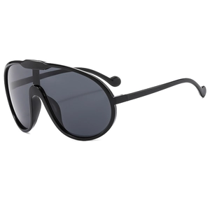 Fashion shield sunglasses with large black frame and dark grey UV lenses at 45-degree angle