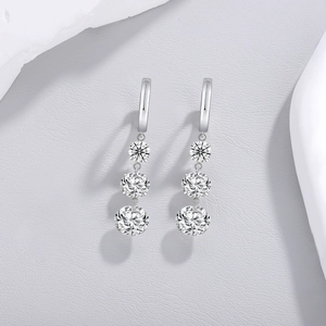Sparkling S925 sterling silver drop earrings with three graduated moissanite stones
