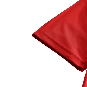 Detail of red breathable mesh polo shirt sleeve with durable double-needle stitching