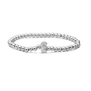 Detail of silver beaded stretch bracelet featuring a sparkling pave zircon letter E pendant