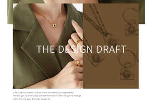 Detail of gold chain necklace with green zircon padlock pendant and matching rings