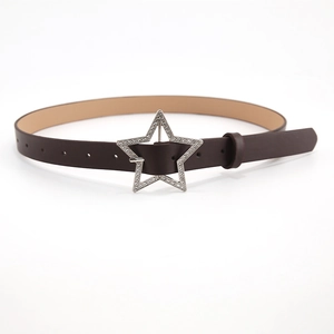 Detail of a dark brown Y2K belt featuring a sparkling rhinestone star-shaped buckle
