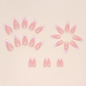 French tip coffin fake nails in nude pink and white V-shape minimalist design