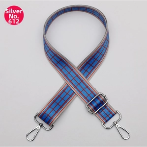 Detail of wide woven bag strap No. 612 in blue and orange plaid with silver hooks