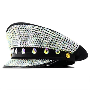 Black military cap with silver rhinestones and colorful gemstones, side profile view
